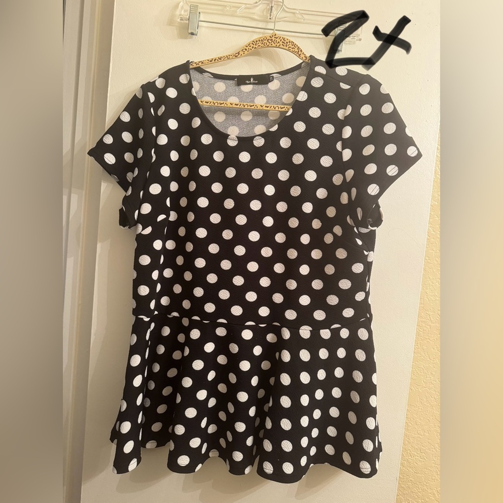 Black and white polka dot peplum top